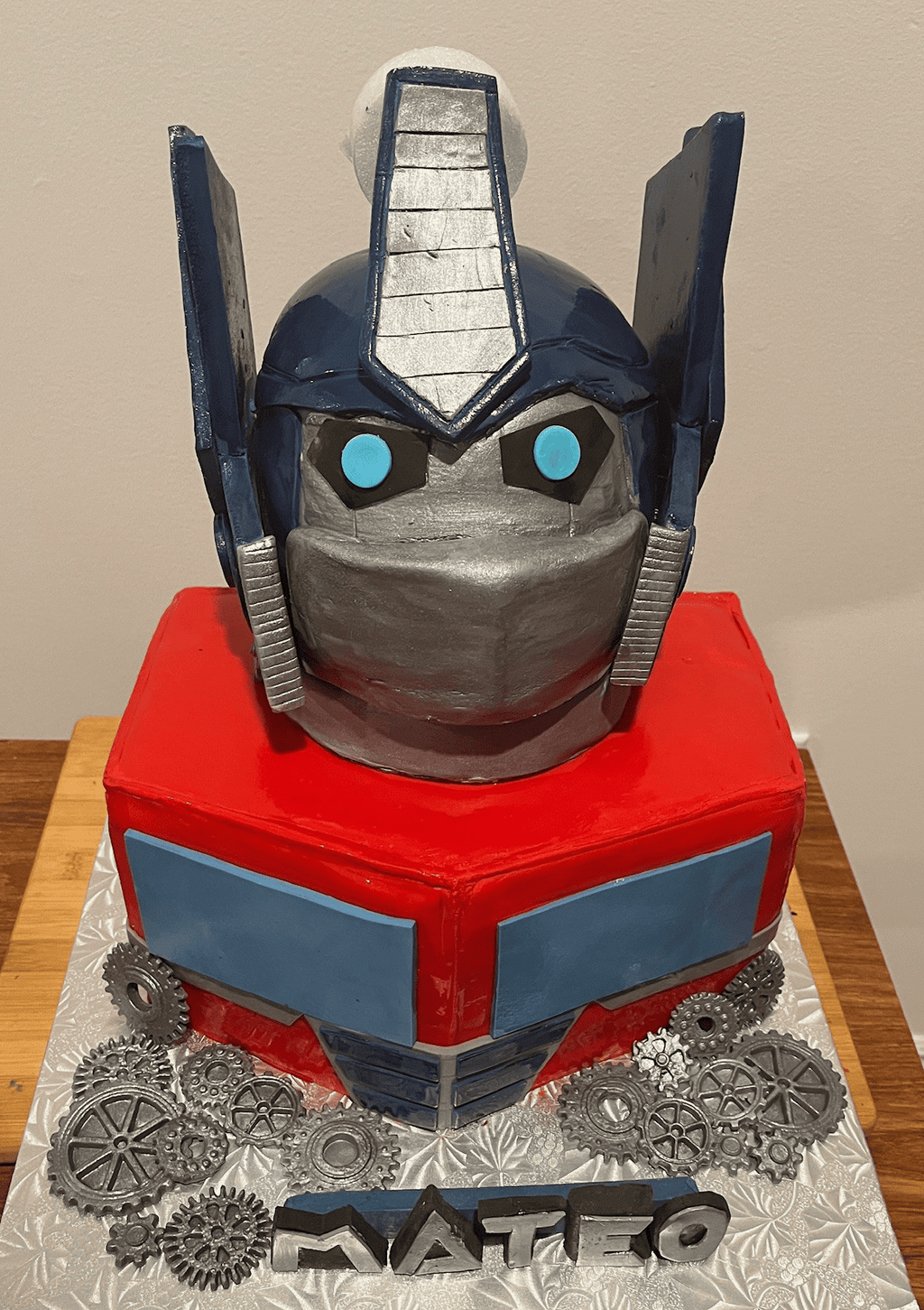 Optimus Prime-Themed Cake with Gear Decorations
